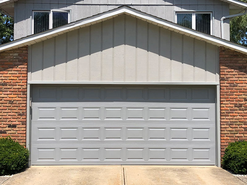 a new garage door installed on family home